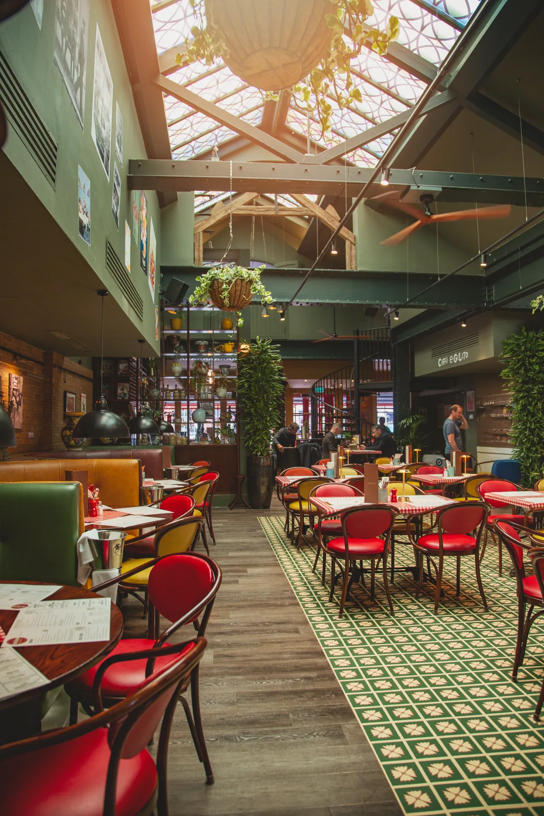 The dining room beneath the glass atrium roof